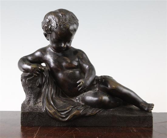 Victorian patinated bronze model of a reclining putto(-)